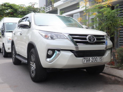 Rent a 7 seater car Fortuner Ha Giang
